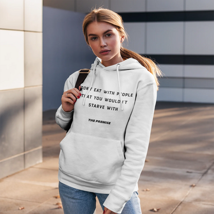 Urban-inspired shot of a stylish woman in a white motivational hoodie, embracing an abundance mindset in the city.